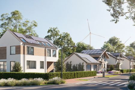 Nachhaltige Häuser mit Solaranlagen, Wärmepumpen und im Hintergrund eine Windkraftanlage.